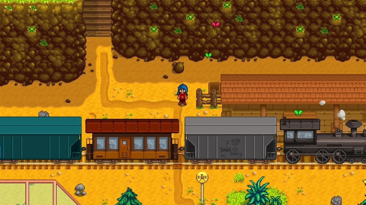 Pixel art farm and village gameplay in Stardew Valley