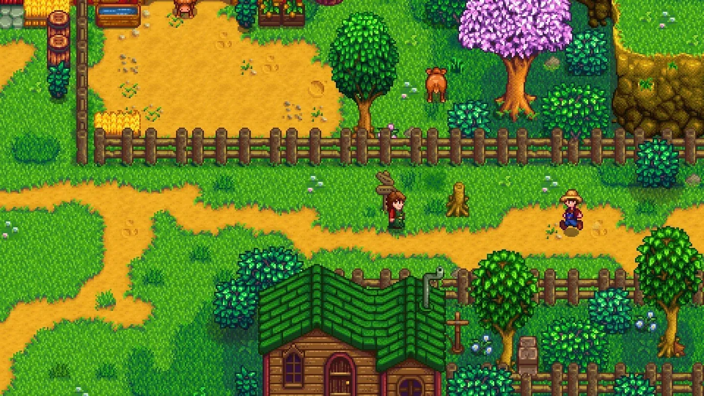 Pixel art farm and village gameplay in Stardew Valley
