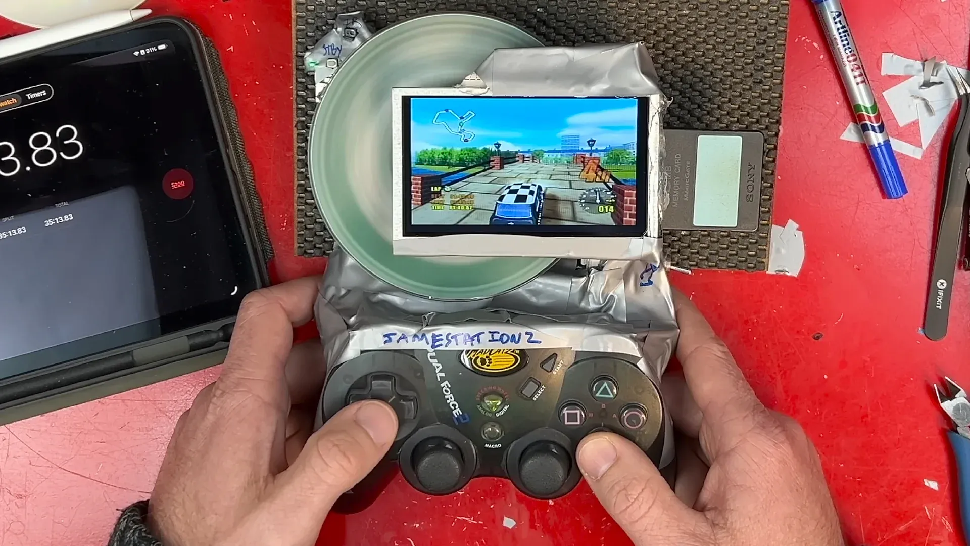 This PS2 Slim handheld is held together with duct tape and beats the Steam Deck on battery